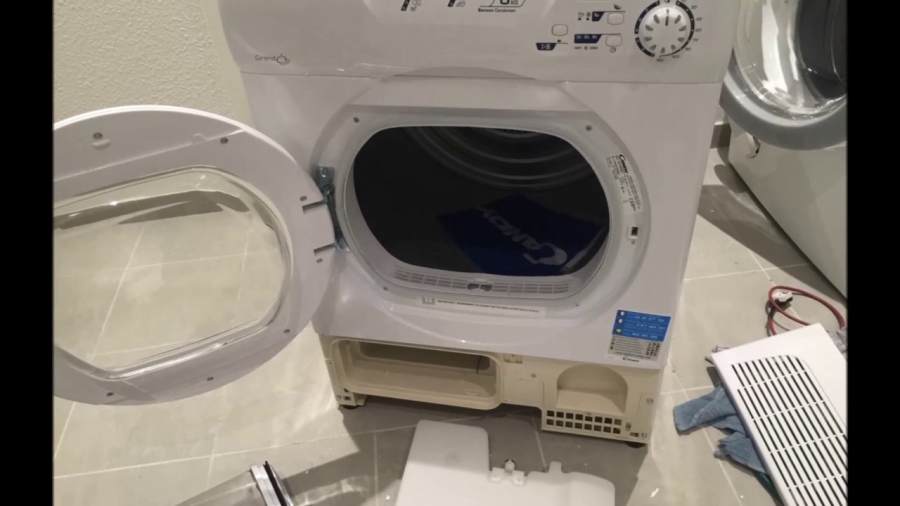 Kỹ thuật viên sửa chữa máy sấy quần áo tại nhà